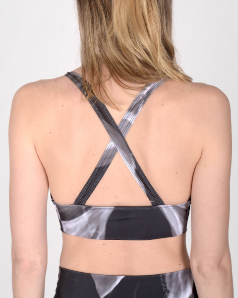 Top cruzado de LYCRA estampada Fusión Negro