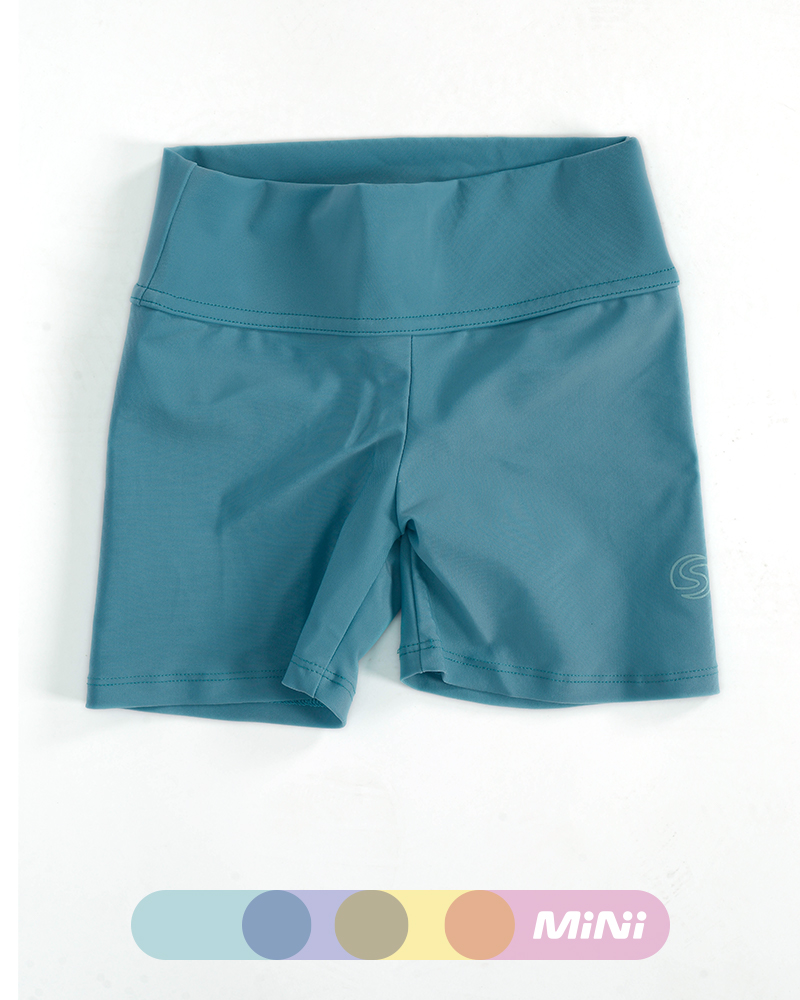 Ciclista corta de niña de LYCRA turquesa pastel